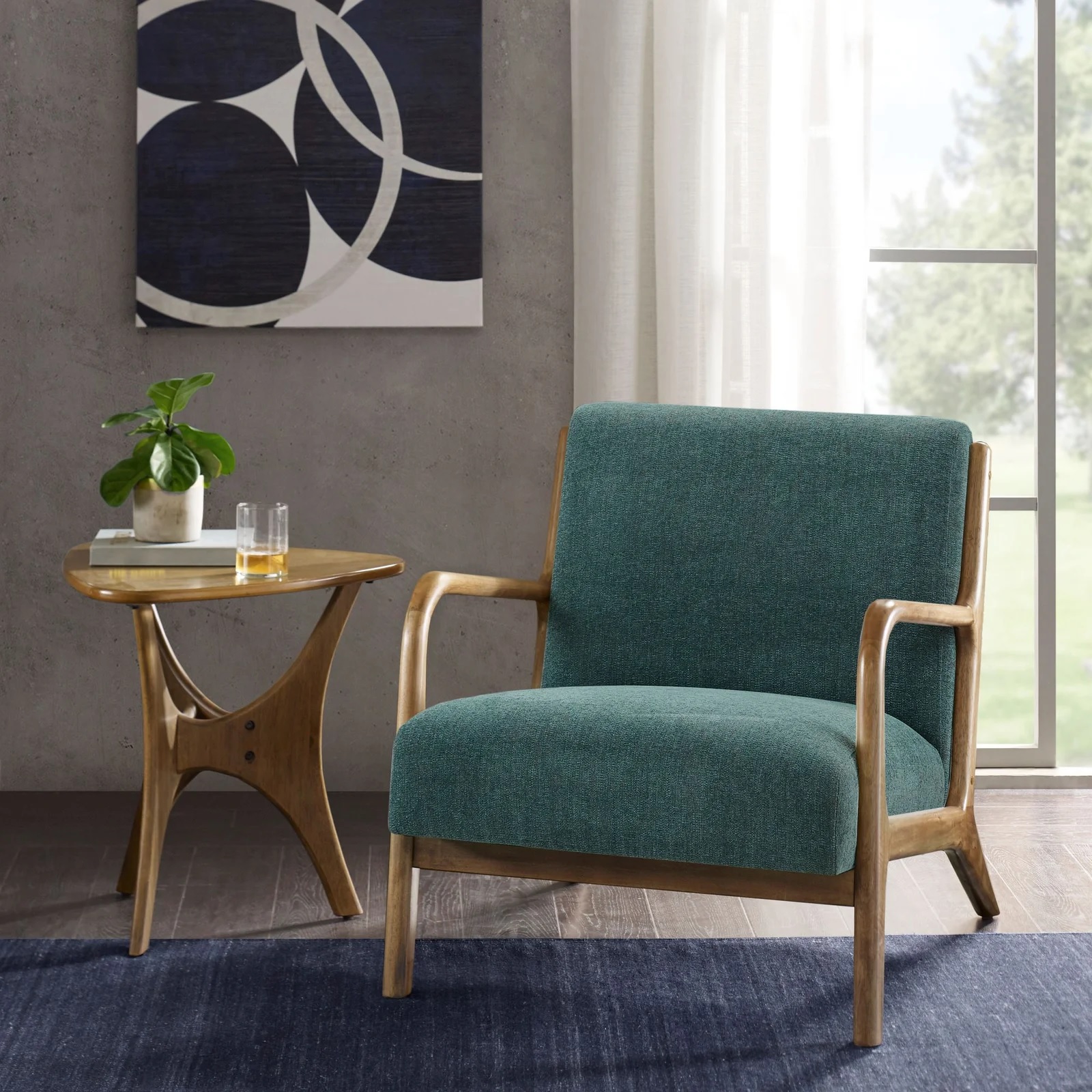 teal green accent chair with exposed wooden framing danish style mid century modern living room furniture for sale online right now blue green upholstery stain resistant