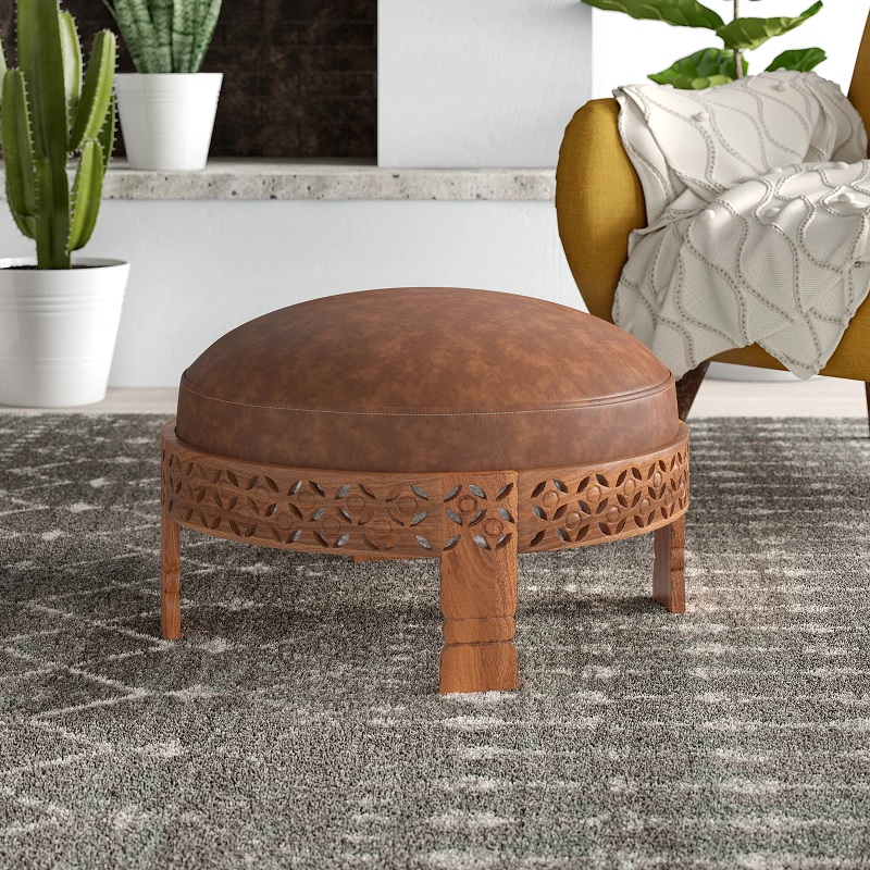 unique round leather storage ottoman with carved wooden base bohemain chic living room furniture ideas stylish luxury footrest with faux leather upholstery brown color