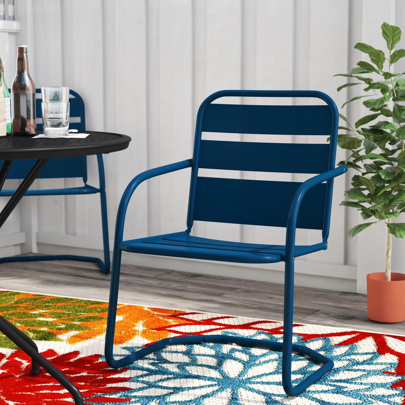 vibrant blue metal patio chair with armrests durable mid century modern retro outdoor seating ideas for poolside yarn garden chairs for sale affordable online