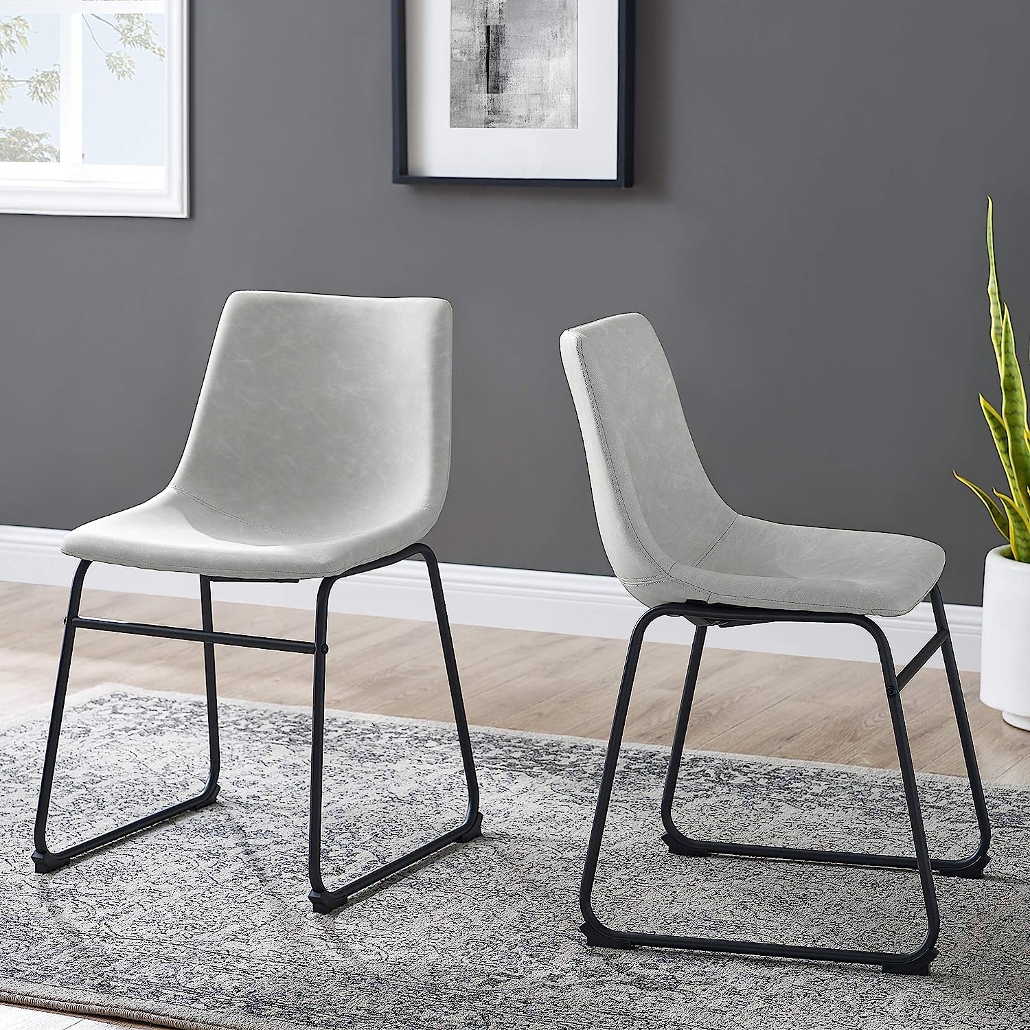 light grey leather dining chairs with smooth seat and sled legs minimalist modern dining room furniture for sale cheap on amazon set of two minimalistic seats