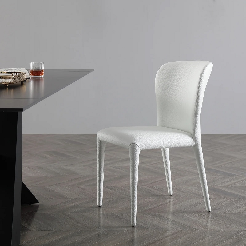 minimalist white leather dining chair with mid height backrest and upholstered legs unique top to bottom upholstery furniture clean simple seating for contemporary dining