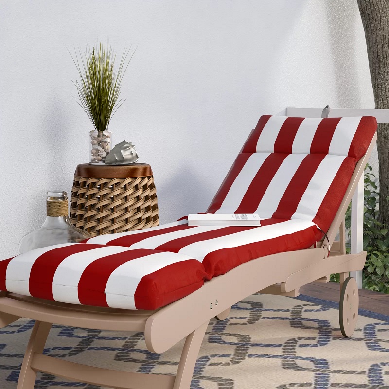 red and white striped outdoor chaise cushion with segmented backrest and footrest convenient ties for secure placement resort quality cushions for patio furniture