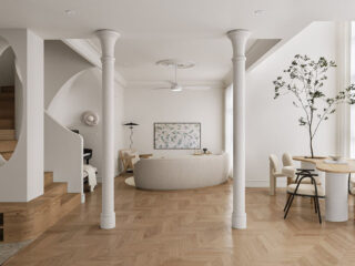 Graceful Curved Decor Meets Warm White Interiors