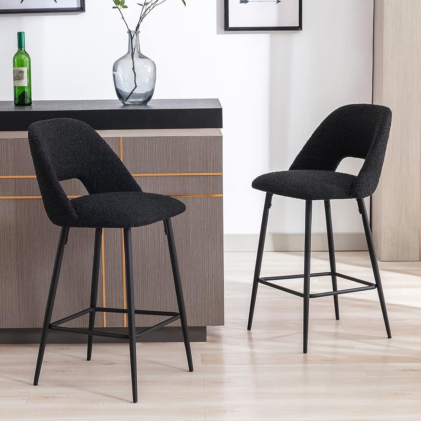 boucle upholstered modern black bar stools with open backrest and footrest matte black base and dark upholstery contemporary stools for kitchen dining room bar height seating