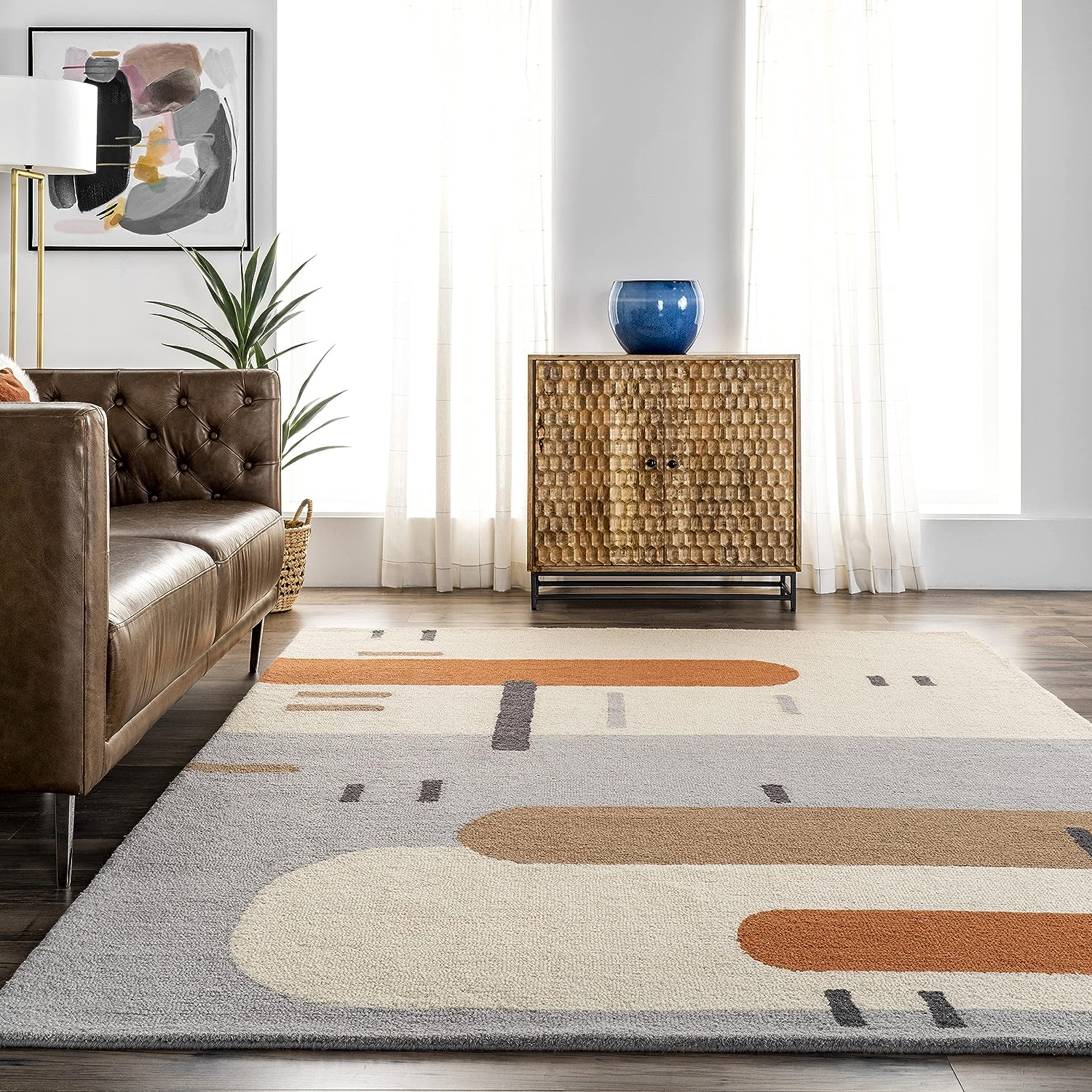 capsule pattern mid century modern geometric rug with orange patterns over grey and ivory base versatile retro MCM rugs for living room wool pile high quality