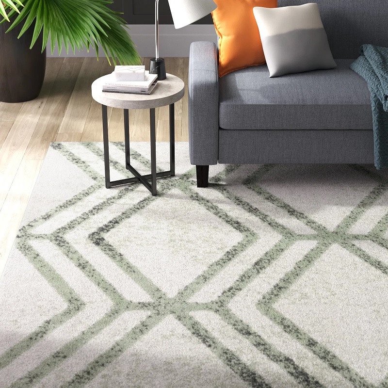 large scale pattern midcentury modern rug green lattice geometric decor light sage coloration retro geometry decor inspiration stain resistant family friendly rugs