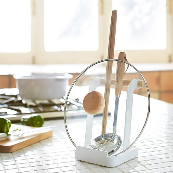 https://www.home-designing.com/wp-content/uploads/2023/10/Japanese-kitchen-gadgets-for-sale-on-amazon-where-to-buy-Yamazaki-Home-japanese-lid-holder-and-spoon-rest-that-doubles-as-a-cookbook-stand-white-metal-wood-handle-600x600.jpg