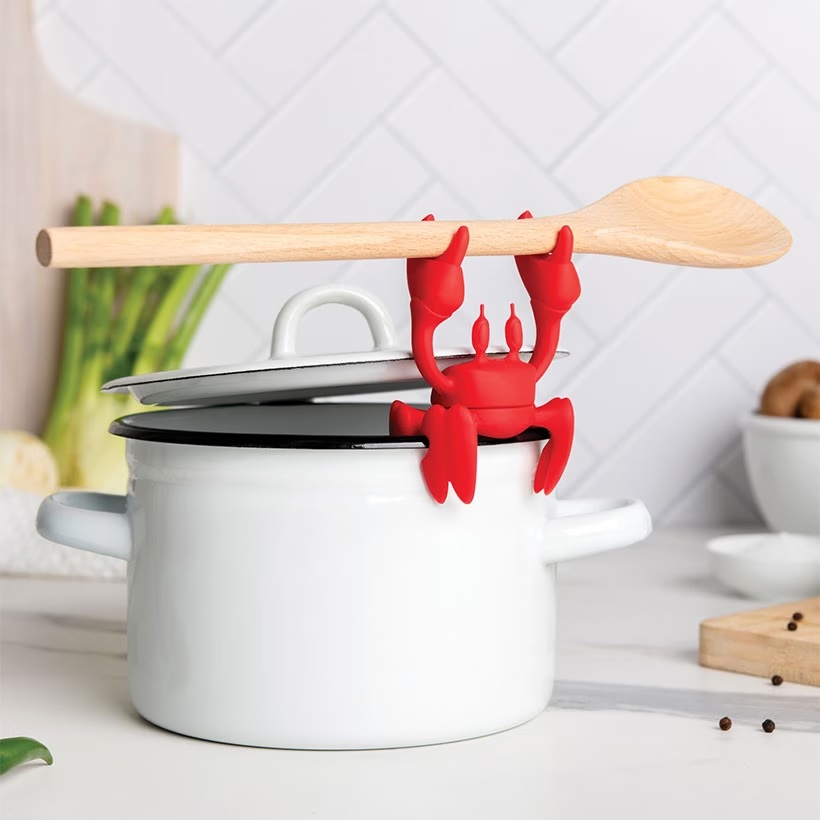 cute kitchen gadgets for sale cheap online adorable red silicone crab spoon holder lid prop to prevent boil overs fun affordable housewarming gift stocking stuffers for sale