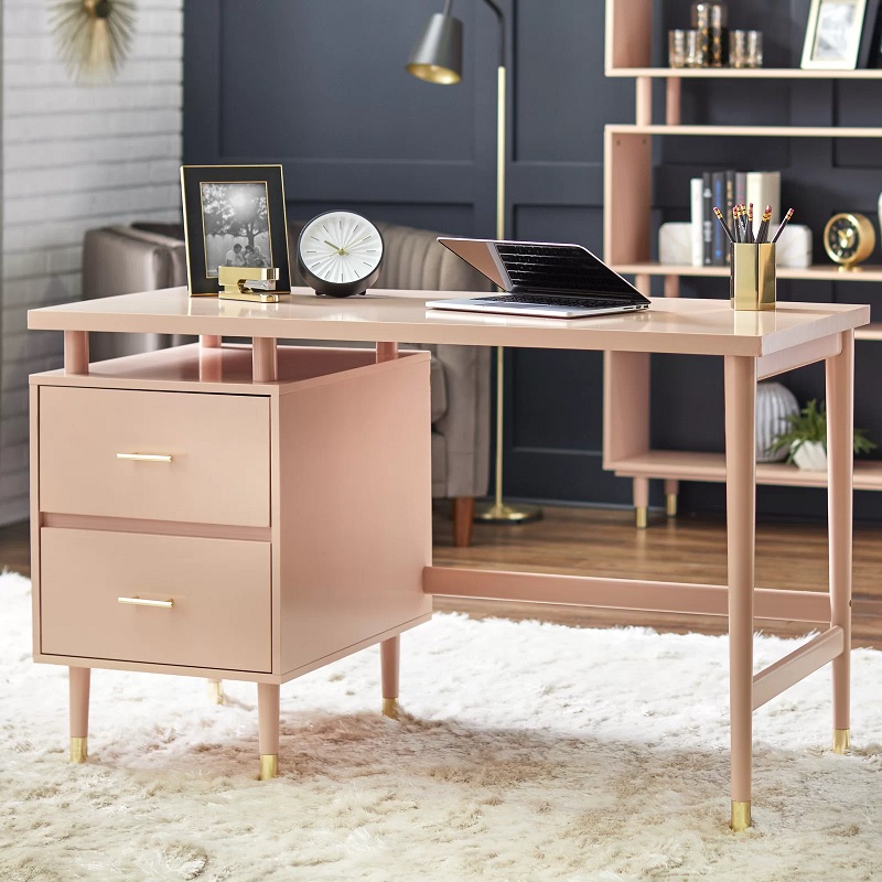 pale blush pink mid century modern desk with drawers and gold foot caps creative retro inspired furniture for womens home office work from home setup inspiration cute