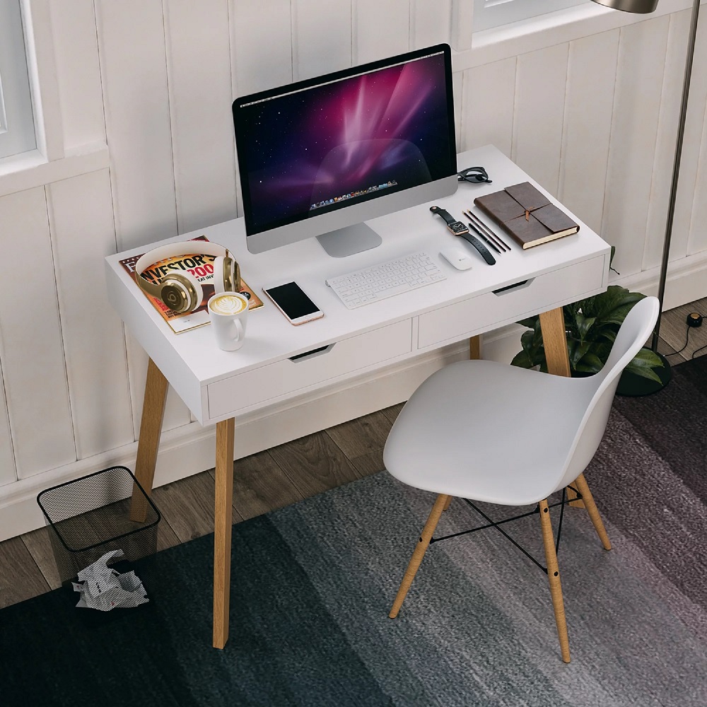 scandinavian small white desk with two drawers and tapered wooden legs mid century modern scandi home office decor inspiration space saving furniture for bedroom office