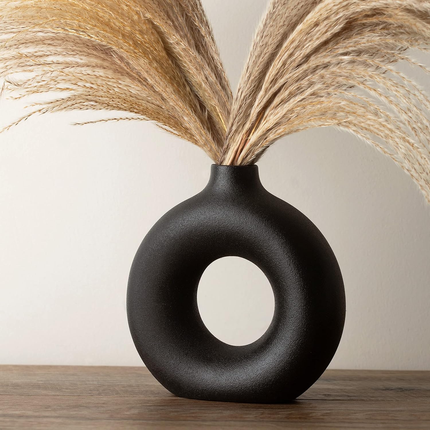 donut shaped black round vase with matte black textured finish circular ceramic vases for sale online cheap modern decor ideas for dorm room how to display pampas grass