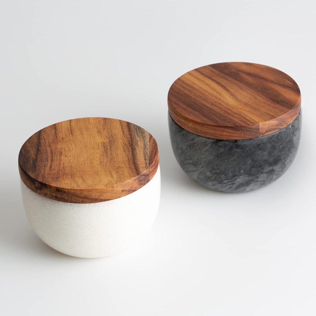 Black and white marble salt and pepper cellars with wood lids