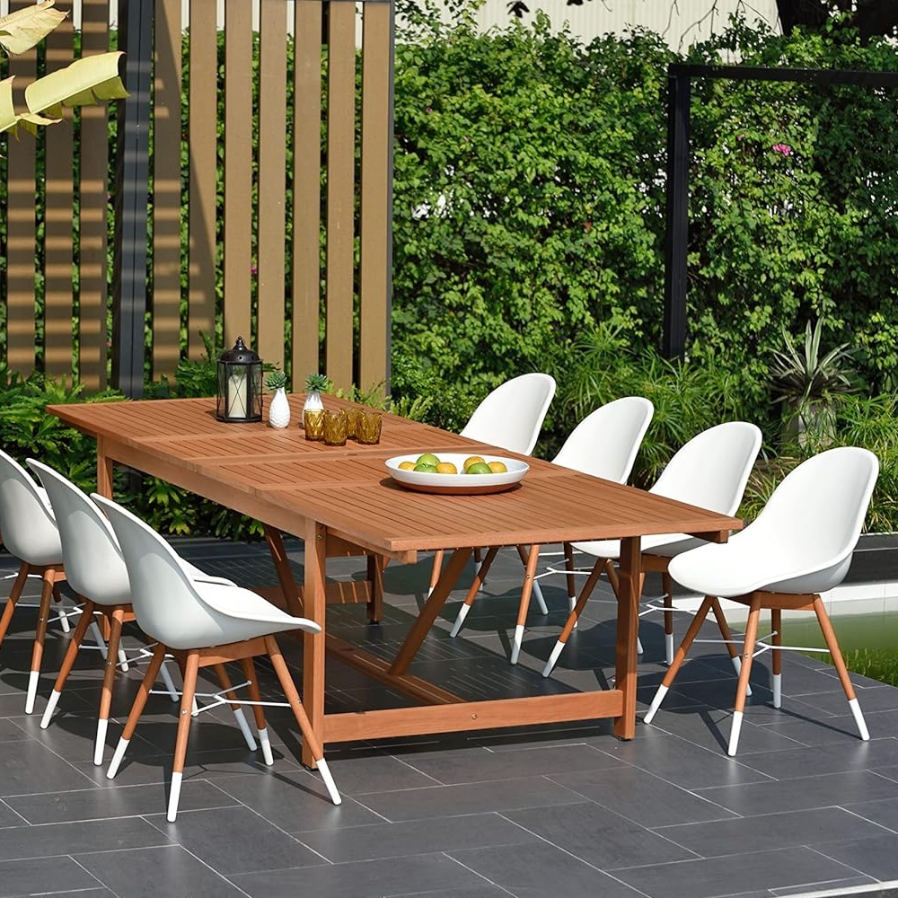 eight-person outdoor dining set with white designer chairs