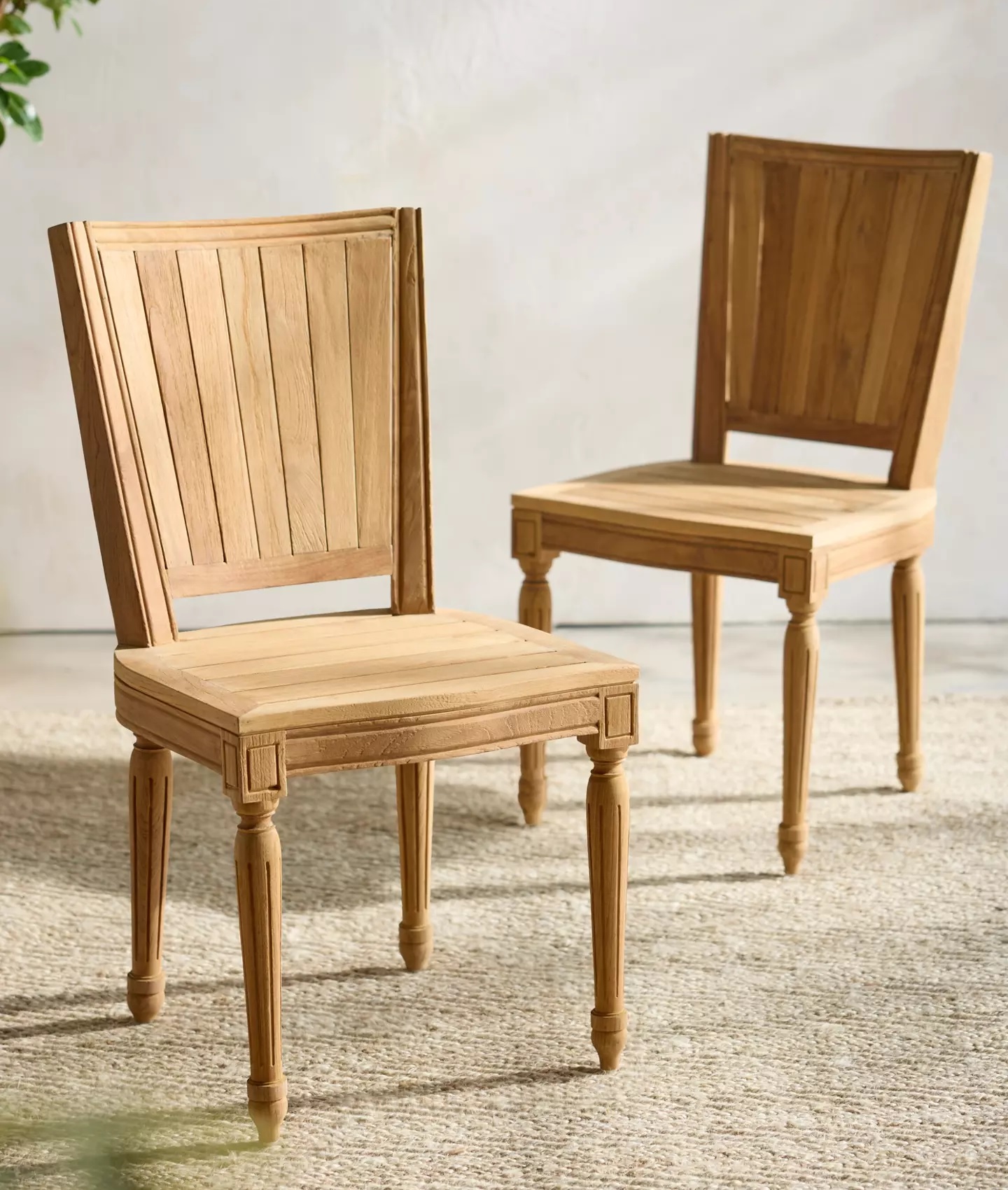 reclaimed teak dining chairs with classic silhouette