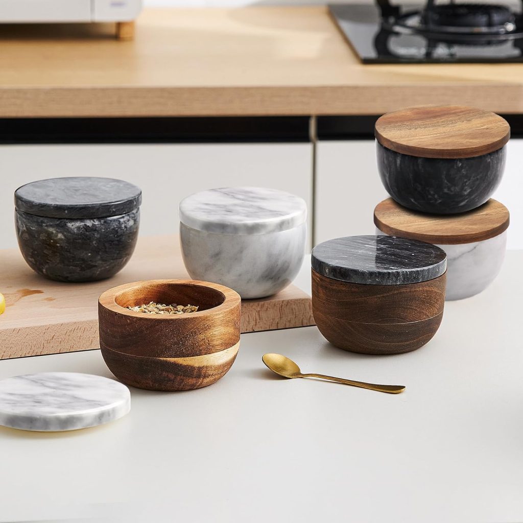 A collection of modern salt and pepper cellars