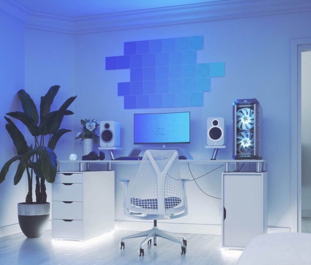 white gaming setup with cool blue tones