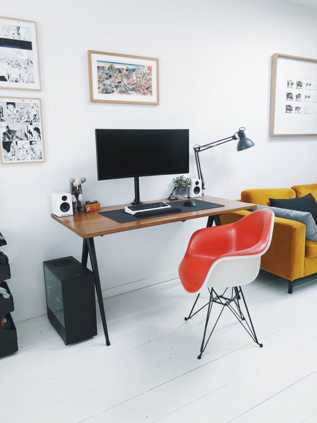 white gaming setup with red chair