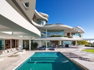 Luxurious Coastal Living: Modern Two-Storey Cape Town Villa with Panoramic Ocean Views and Wellness Amenities