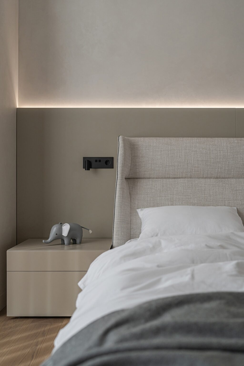 cozy bed and accent lighting