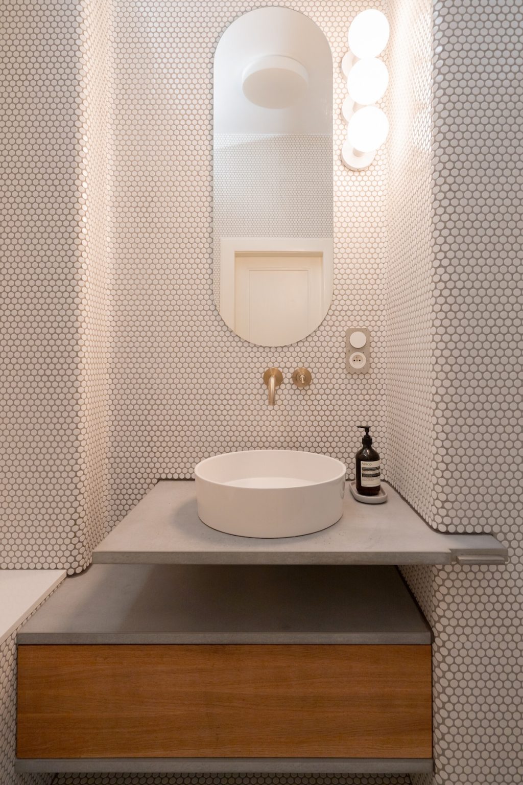 interesting bathroom vanity with gold faucet