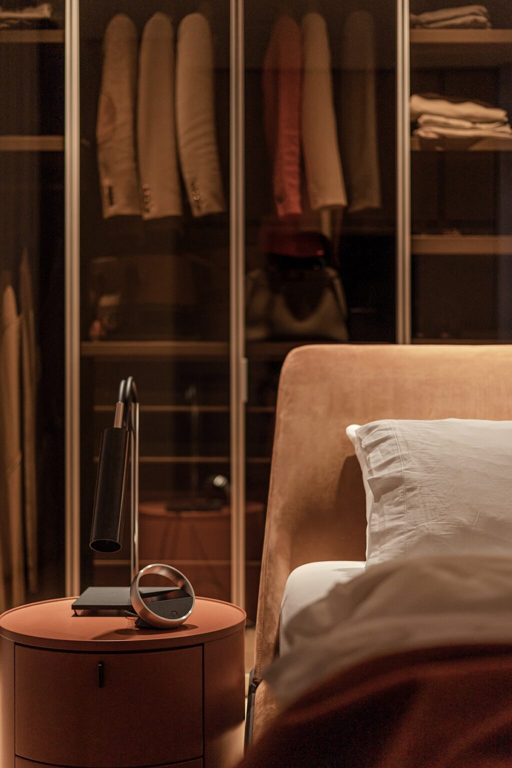 nightstand with sleek lamp