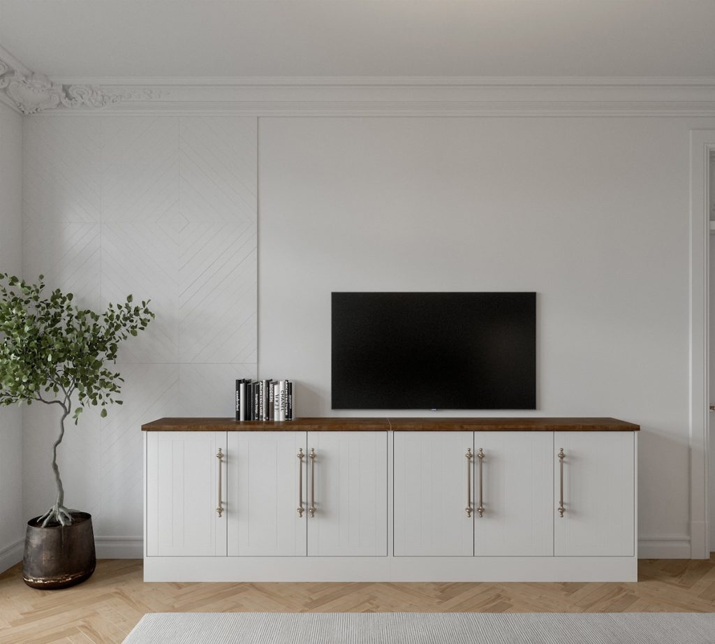 sleek cabinetry with wooden top and plant