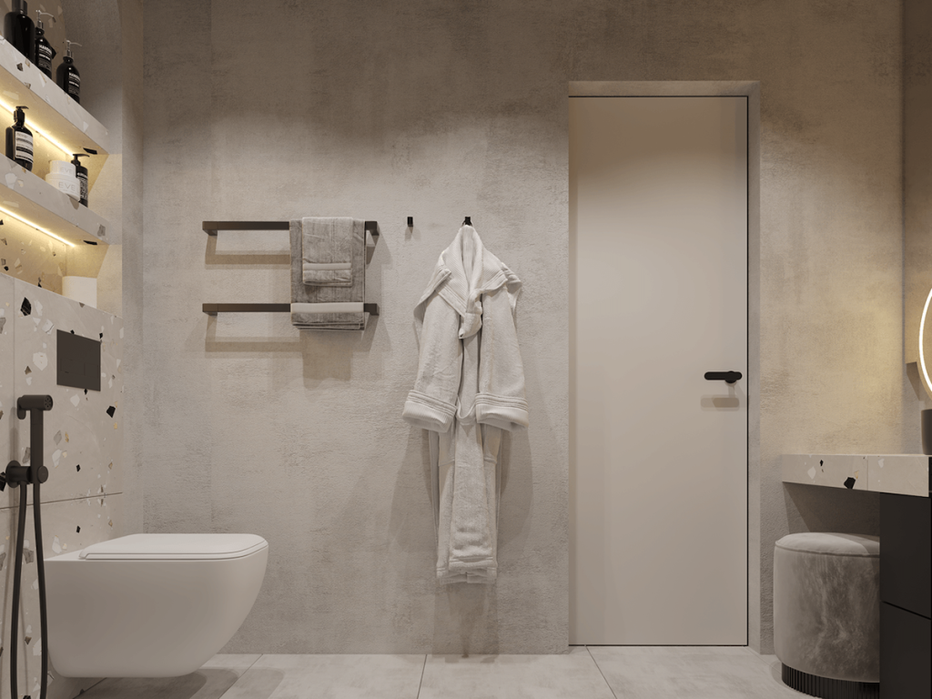 bathroom with hanging bathrobe and towel rack