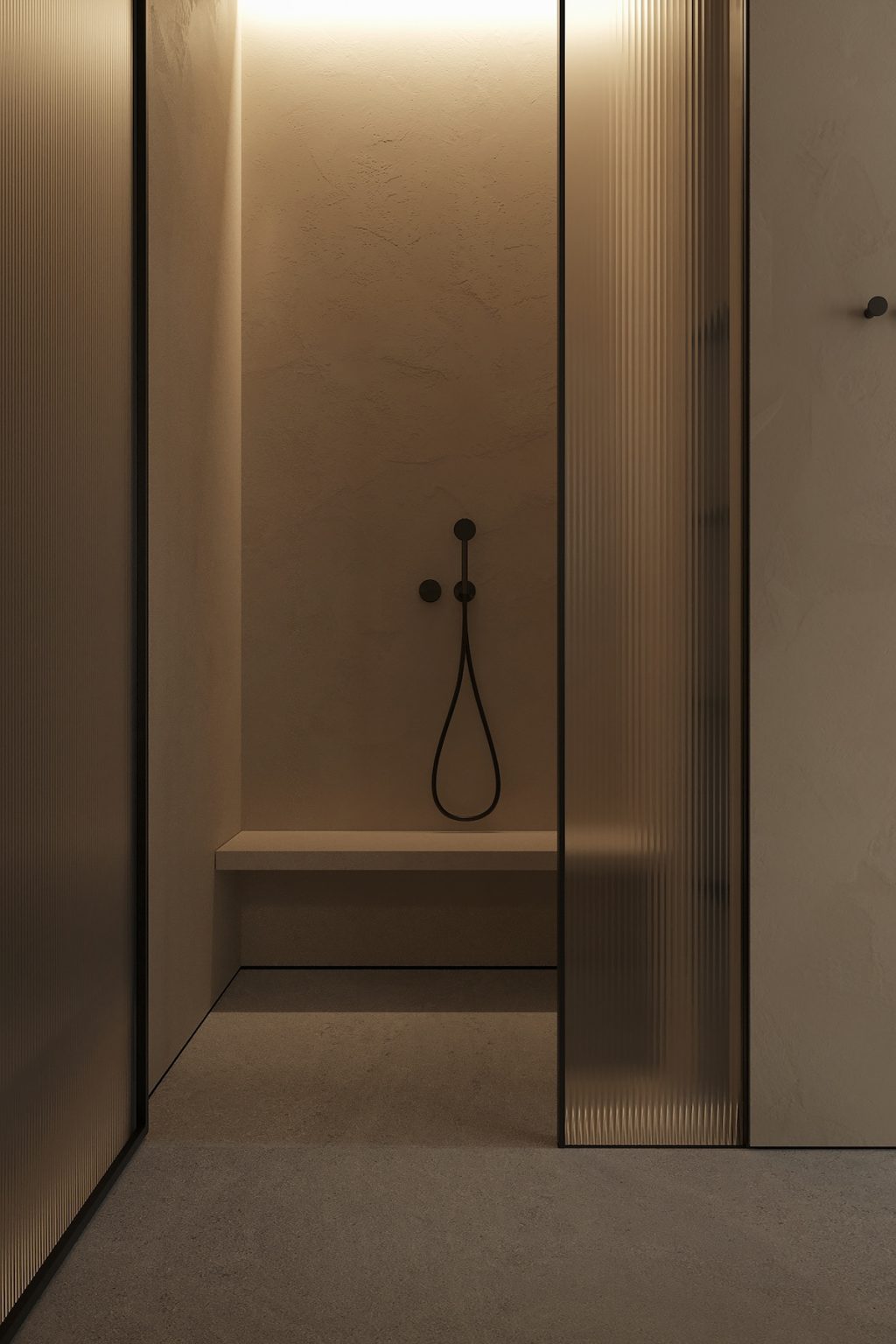 bathroom with shower cubicle and black hardware