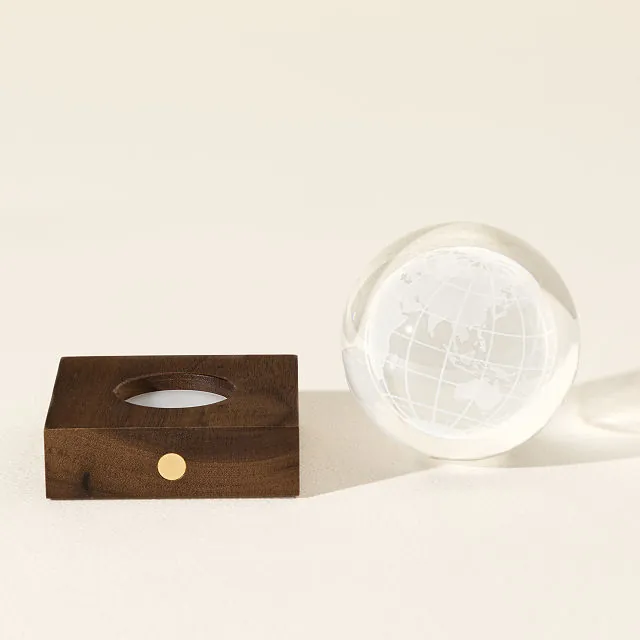 earth light globe and wooden base