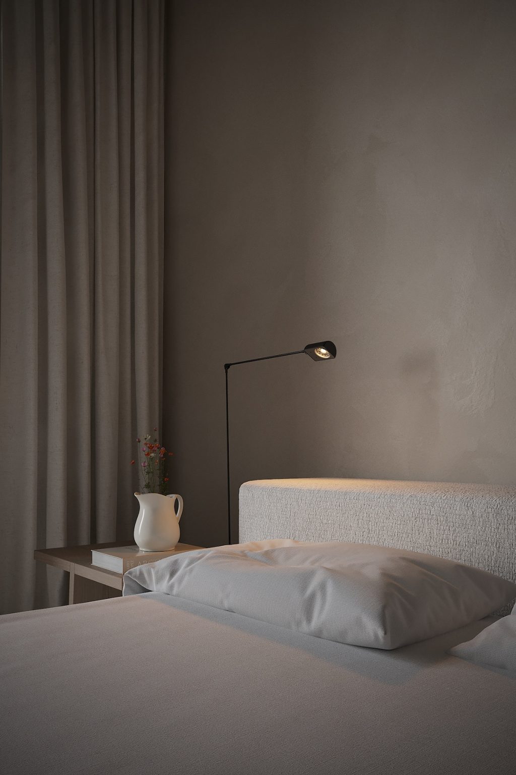 simple upholstered bed and lamp