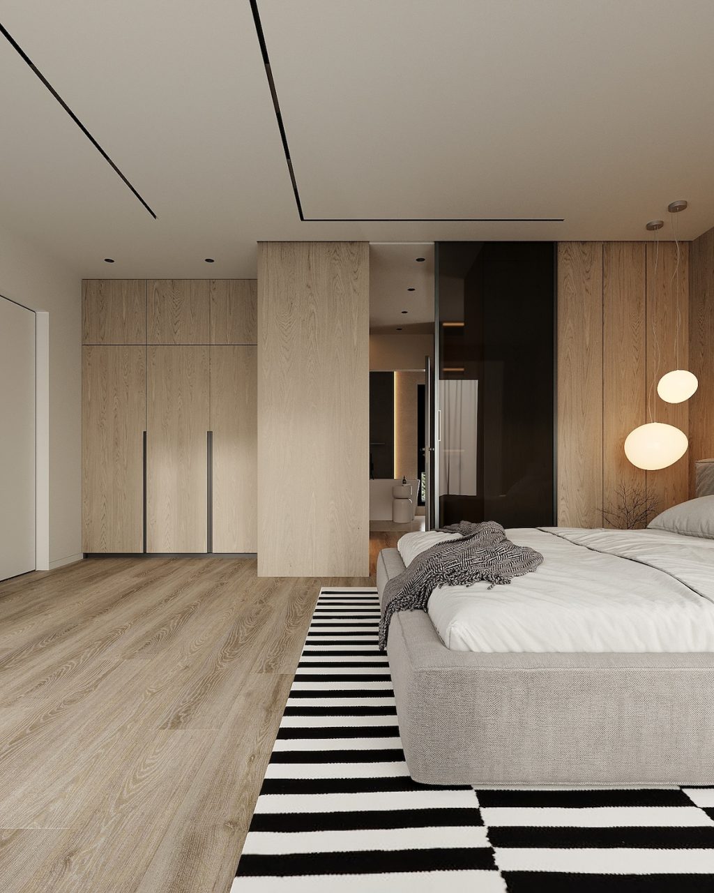 wooden floor in bedroom with grey bed