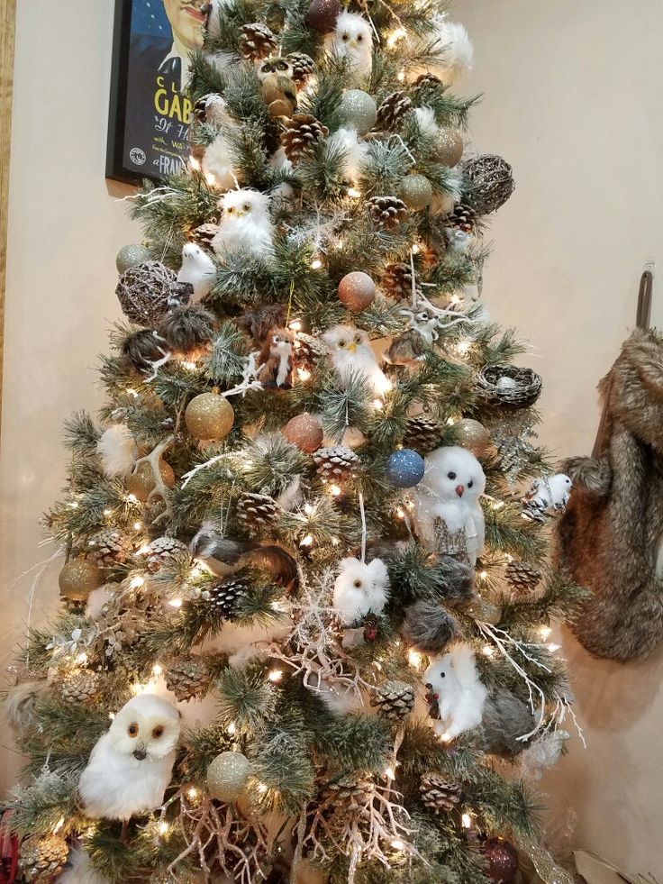 Woodland christmas creatures on tree