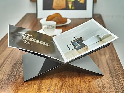 black acrylic book stand on wooden table