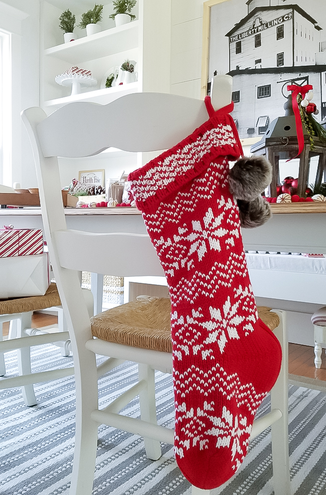 knitted stocking on back of french chair