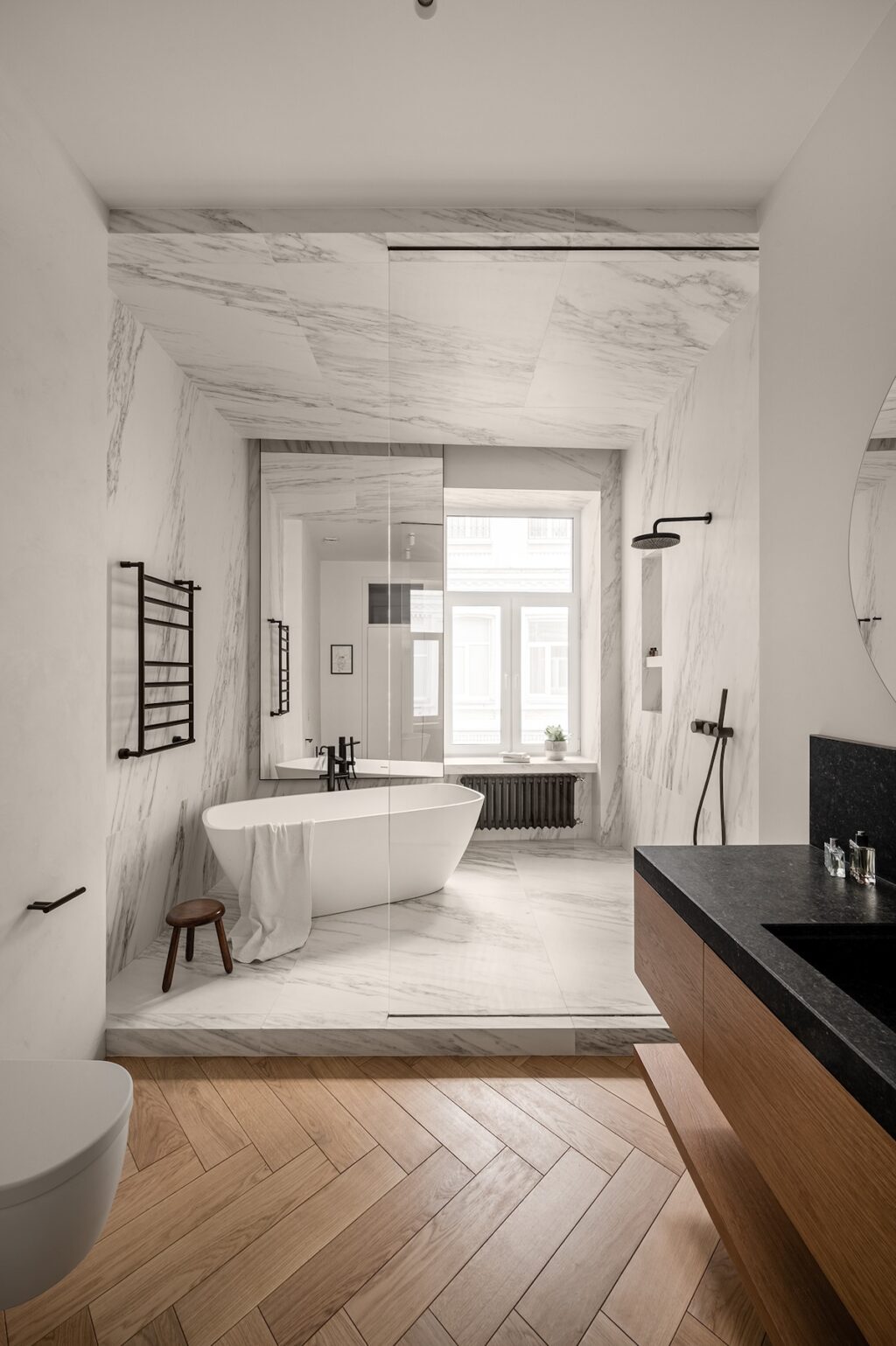 modern white bathroom with black accents