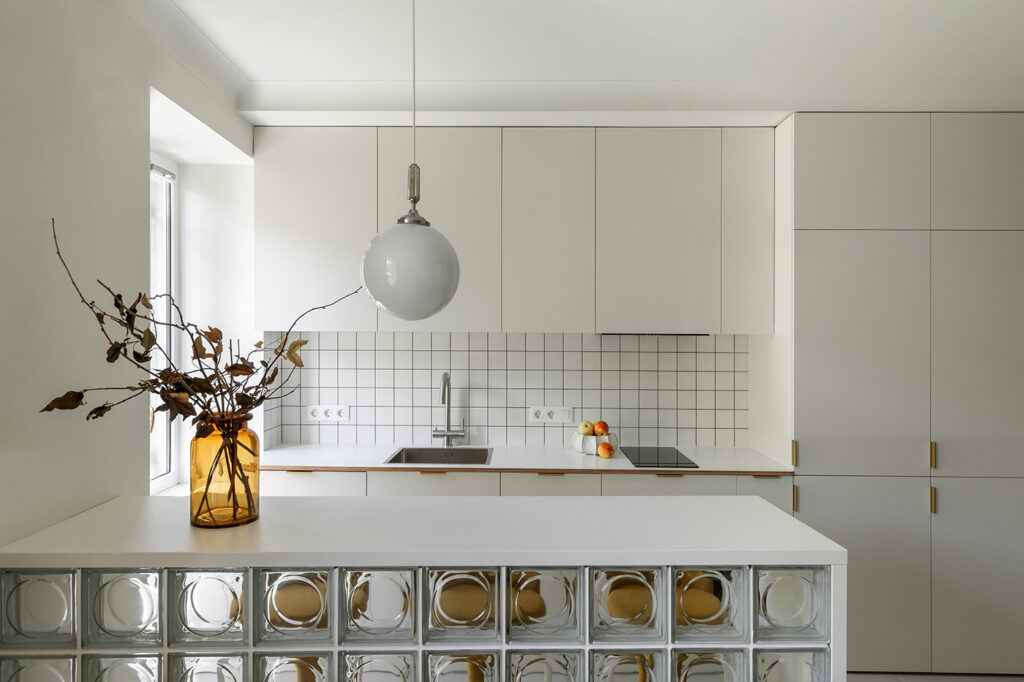 modern white kitchen with grid backsplash