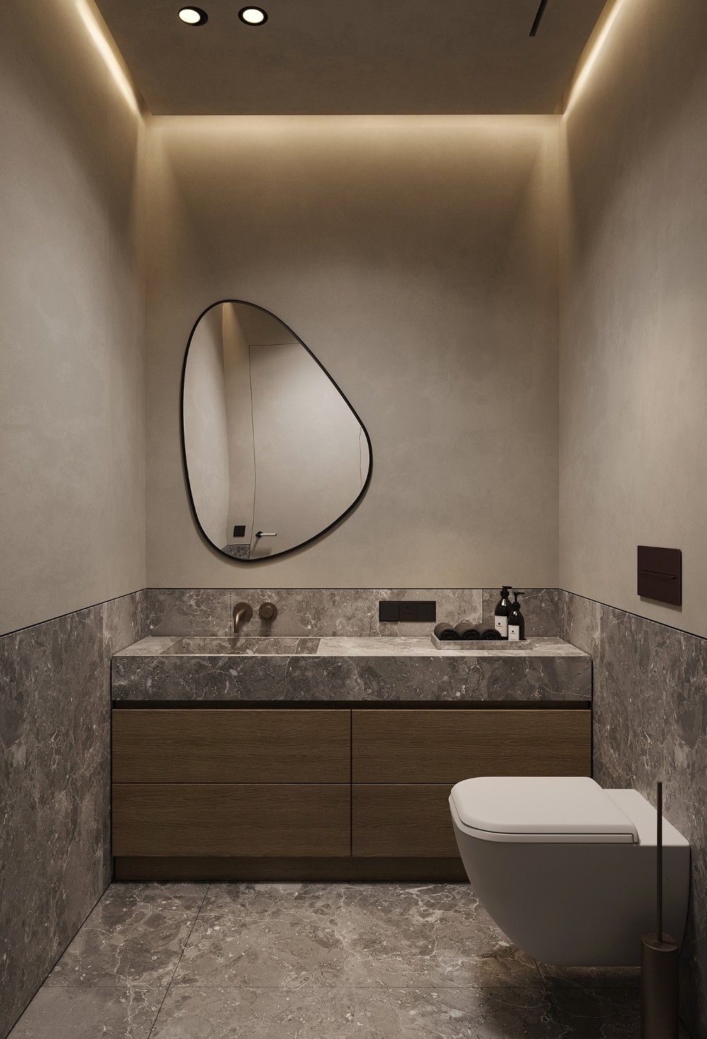 compact bathroom with organically shaped mirror