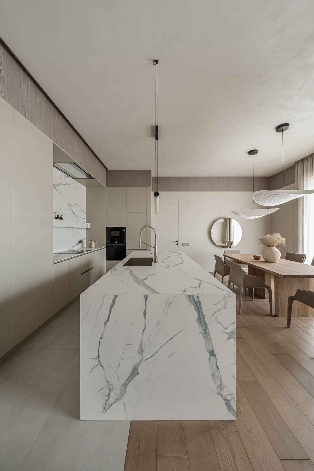 open floor kitchen and wooden dining space