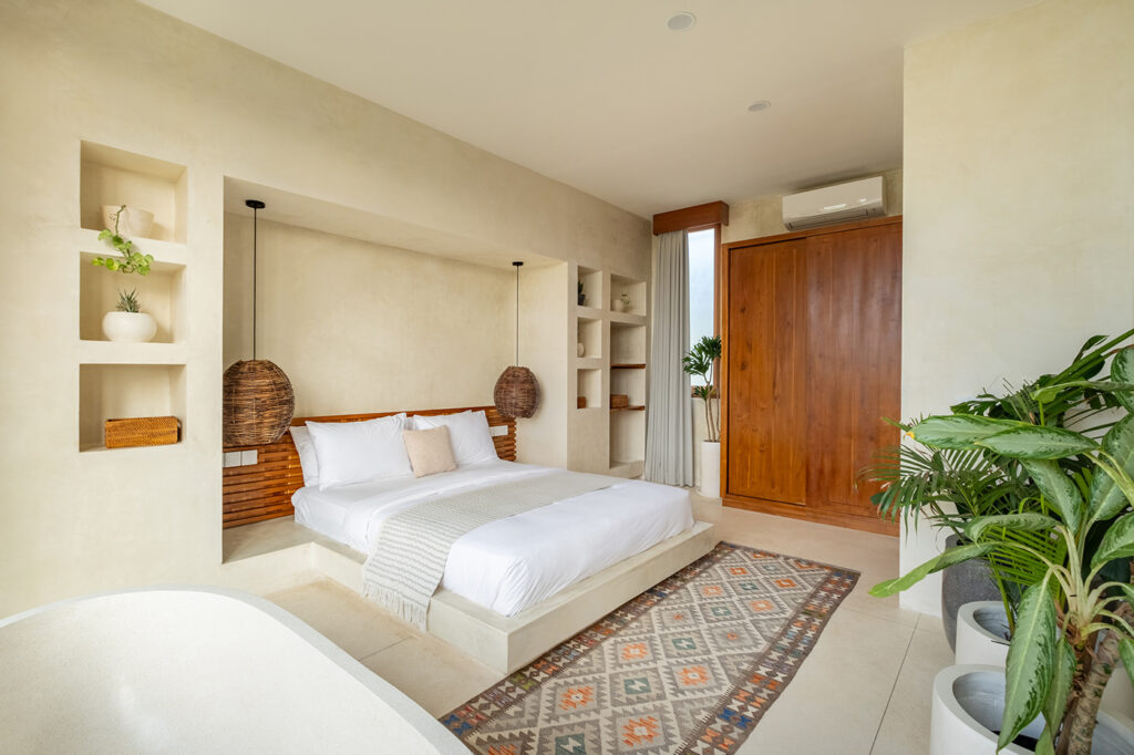 boho bedroom with natural pendant lights