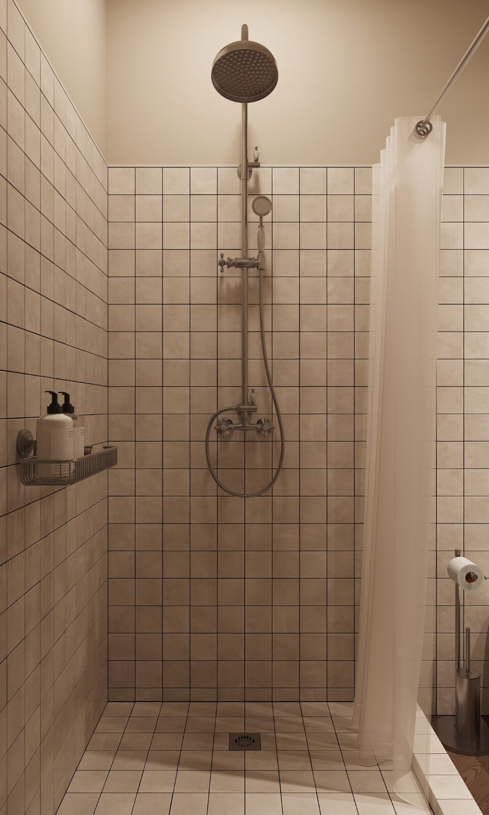 tiled shower cubicle with stainless steel fixtures